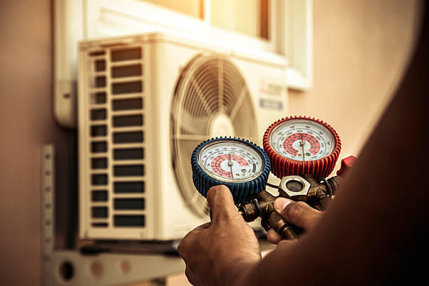 Professional Air Conditioning Service technician working in Grant, AL